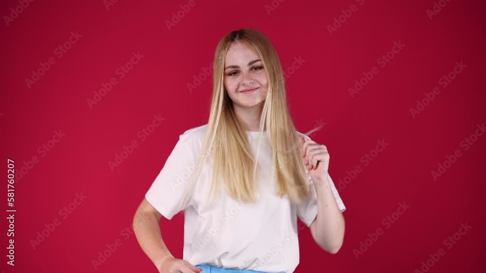 4k video of one girl dancing over red background. 4k video of one girl dancing over red background.