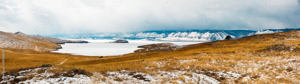 BAIKAL LAKE, RUSSIA-MARCH 1,2023: View of winter Baikal from Olkhon island