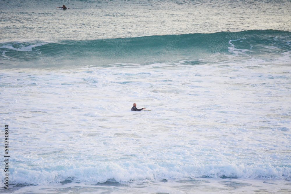 Australian surfers paddling Phillip Island waves surfboard surfboards ocean swim water