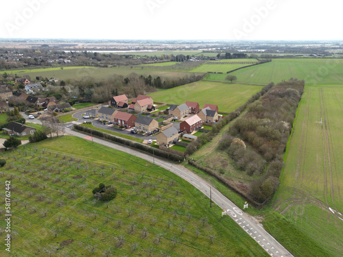 Aerial view of a new social and private housing development at the edge of an East Anglian village.  photo