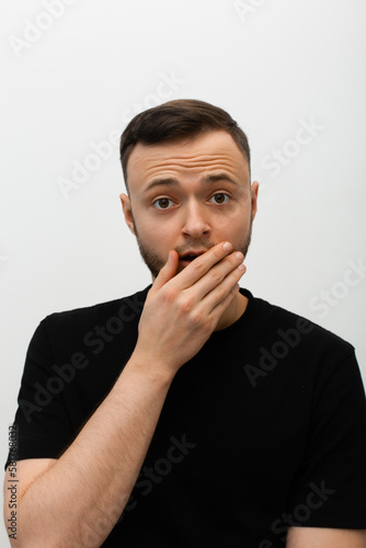 young man expressing surprised emotions, depressed