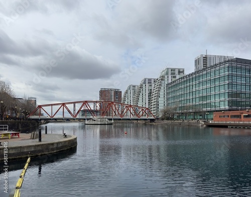 Modern buildings next to the river with reflections in the water. Salford Quays England.  © ReayWorld