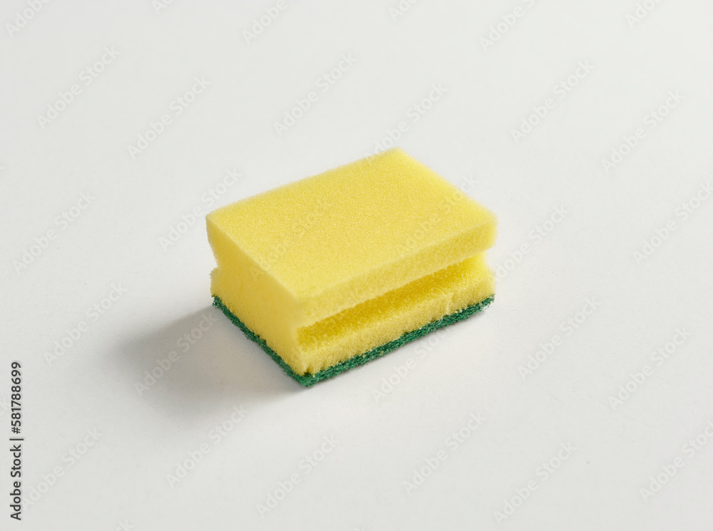 Kitchen dish sponge yellow and green isolated white background. Kitchen dish sponge yellow and green isolated white background.
