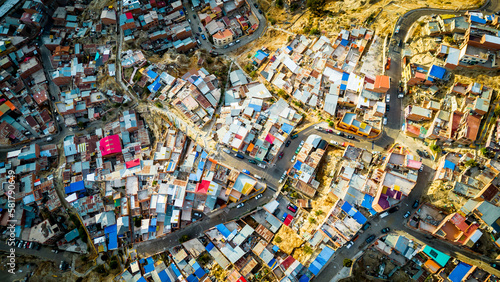 Aerial Street View of La Paz, Bolivia, Houses, Roads, Cars and Traffic, Flying Above the Capital of South American Metropolitan Crowded Town © Michele