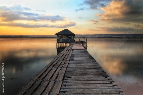 wooden pier at sunset