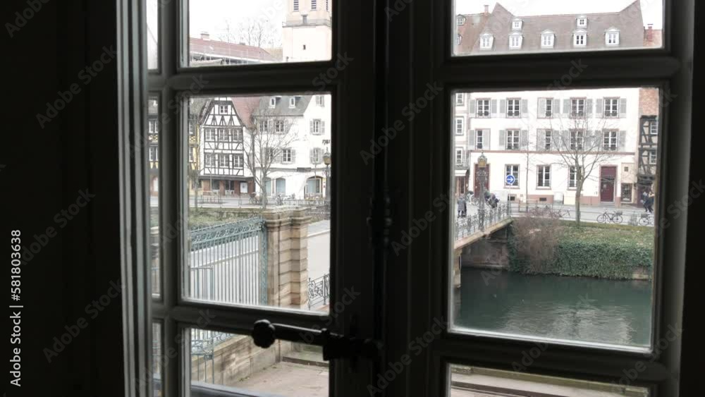 View from the window on the river Ill and the old half-timbered houses of Strasbourg, France View from the window on the river Ill and the old half-timbered houses of Strasbourg, France