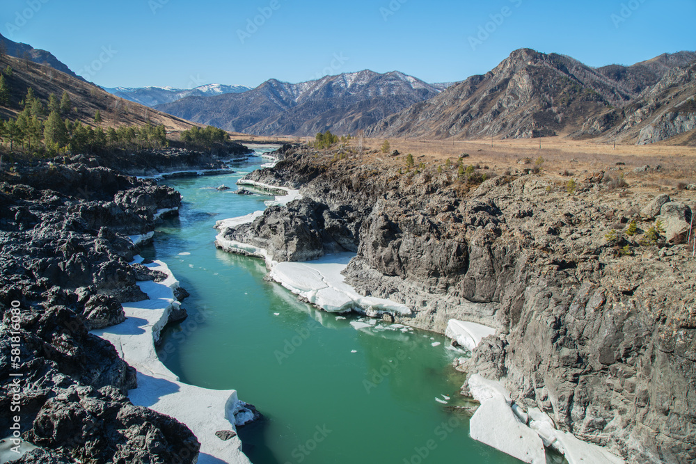 Katun river in Altai mountains in April, sunny day, travel and vacation