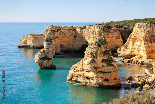 Beautiful cliffs and rock formations at Marinha Beach in Algarve, Portugal
