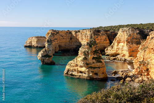 Beautiful cliffs and rock formations at Marinha Beach in Algarve, Portugal