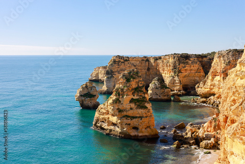 Beautiful cliffs and rock formations at Marinha Beach in Algarve, Portugal