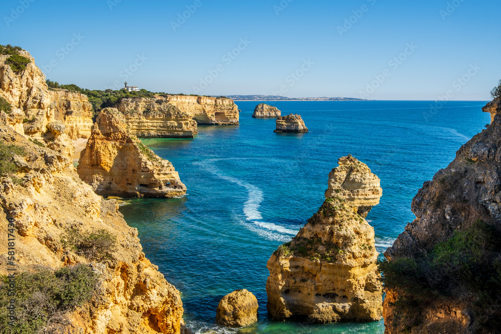 Beautiful cliffs and rock formations at Marinha Beach in Algarve, Portugal