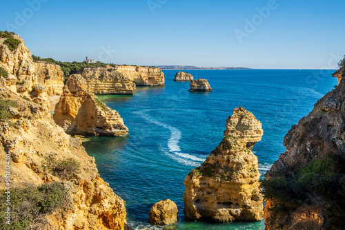 Beautiful cliffs and rock formations at Marinha Beach in Algarve, Portugal