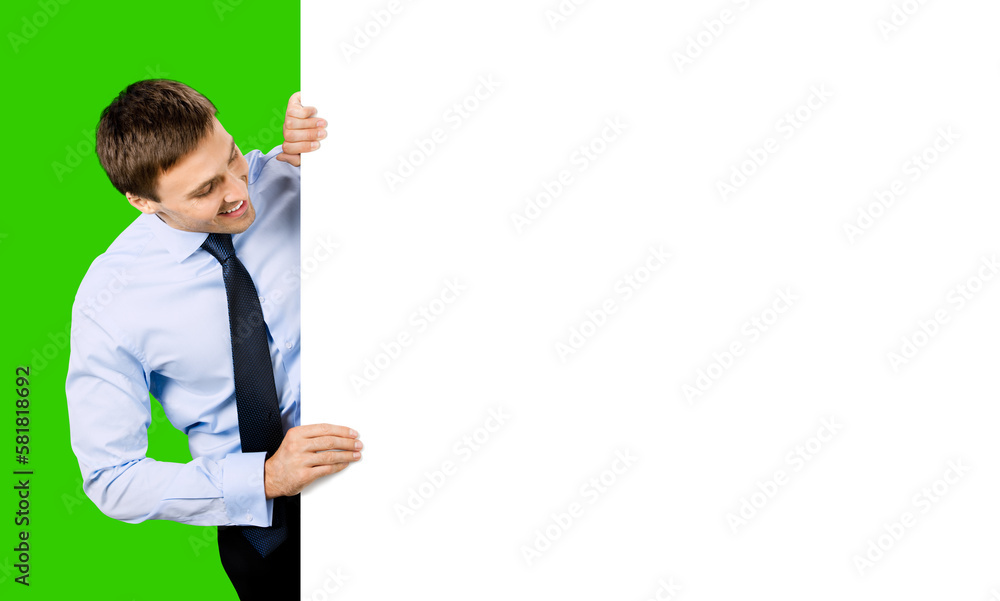 Portrait image of business man professional bank manager in confident cloth tie. Businessman stand behind look at empty white banner signboard with copy space area. Isolate green chroma key background Portrait image of business man professional bank manager in confident cloth tie. Businessman stand behind look at empty white banner signboard with copy space area. Isolate green chroma key background
