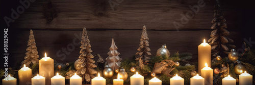 christmas decoration in front of a wooden background with candles and branches, modern and beautiful ornaments for festive header or banner on social media with negative space