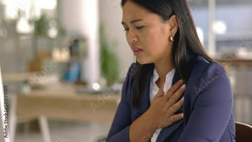 Business woman, office and heart pain of company worker at computer with stress. Corporate, cardiac arrest and working employee with medical problem, chest ache and difficulty breathing from anxiety photo