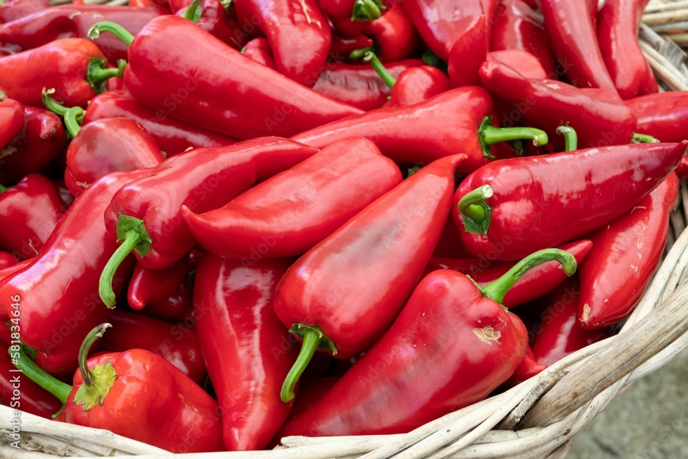 Closeup of a pile of red bell peppers