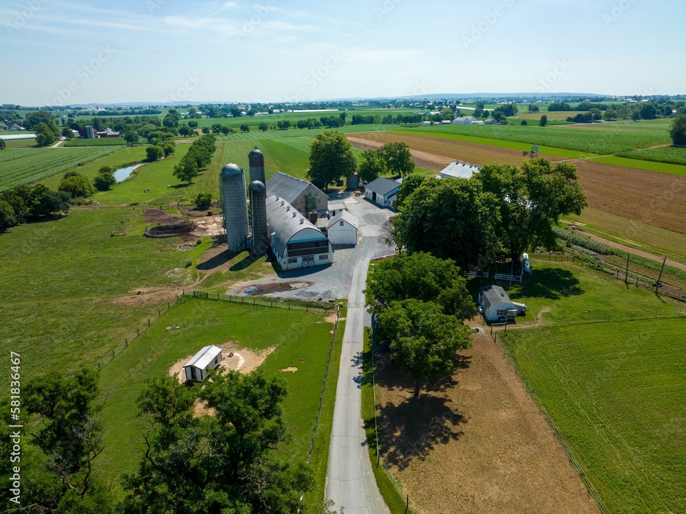 Aerial view of a countryside area with fields and houses Aerial view of a countryside area with fields and houses