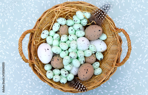 Easter eggs in a wicker basket. Happy Easter © drobacphoto