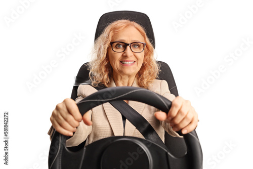 Portrait of a woman with glasses driving a car