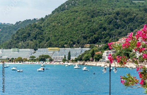 Beaches and hotels in the seaside town of Rabac in Croatia photo