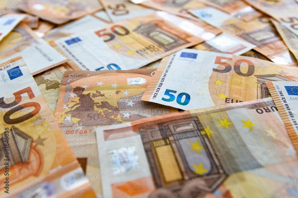 Close-up shot of scattered 50 Euro banknotes