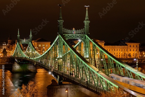 Aerial view of the illuminated Liberty bridge across the Danube river in Budapest  Hungary