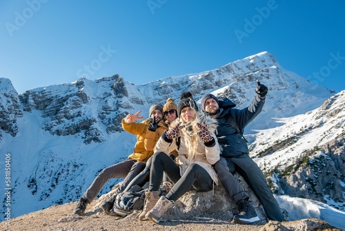 Group of friends posing for photo in Julian Alps in Slovenia