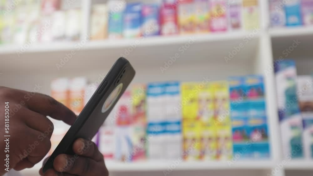Close Up, Hands of Professional Black African Pharmacist Using Smartphone to check availability of Medicine, Drugs, Healthcare Products in Drugstore Store
Close Up, Hands of Professional Black African Pharmacist Using Smartphone to check availability of Medicine, Drugs, Healthcare Products in Drugstore Store
