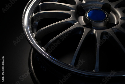 automotive aluminum die-cast disc on a dark background