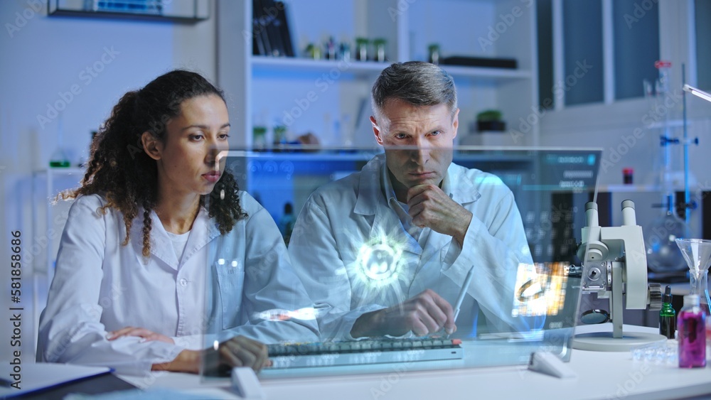 Fototapeta premium Laboratory scientists looking at infected cell mutation, discussing experiment results