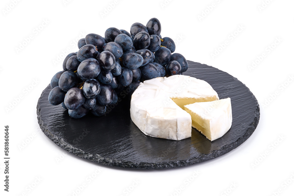 Dark blue grape with camembert cheese, isolated on white background. High resolution image.
