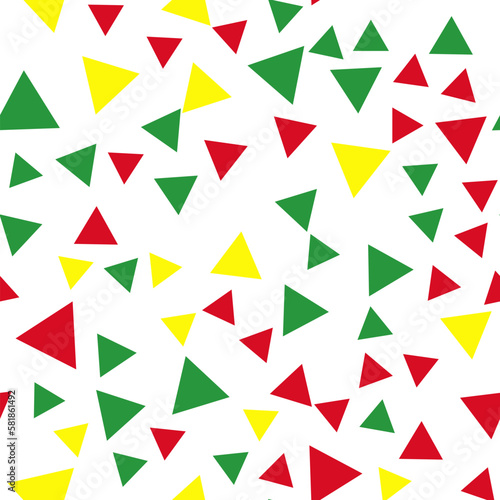 Geometric seamless pattern of vibrant green, red, blue, yellow triangles for textile, paper and other surfaces