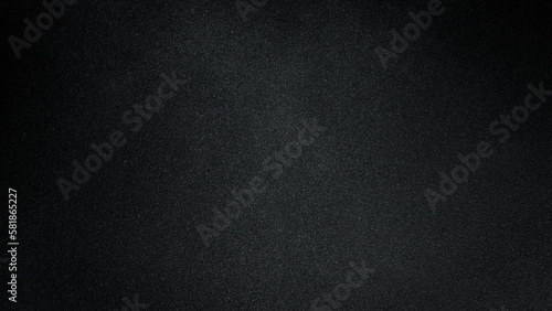 Black textured photo background with stone imitation. Free space for text. Top view.
