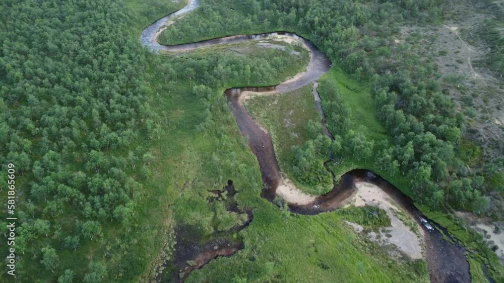 A meandering wilderness river in Lapland, Finland A meandering wilderness river in Lapland, Finland