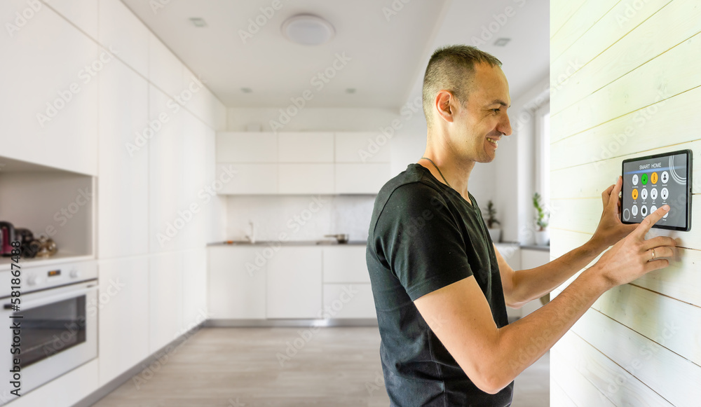 Smart home control on tablet. Interior of living room in the background. Smart home control on tablet. Interior of living room in the background.