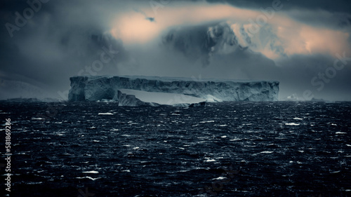 Moody, Scenic Seascape of Huge Iceberg In Antarctica