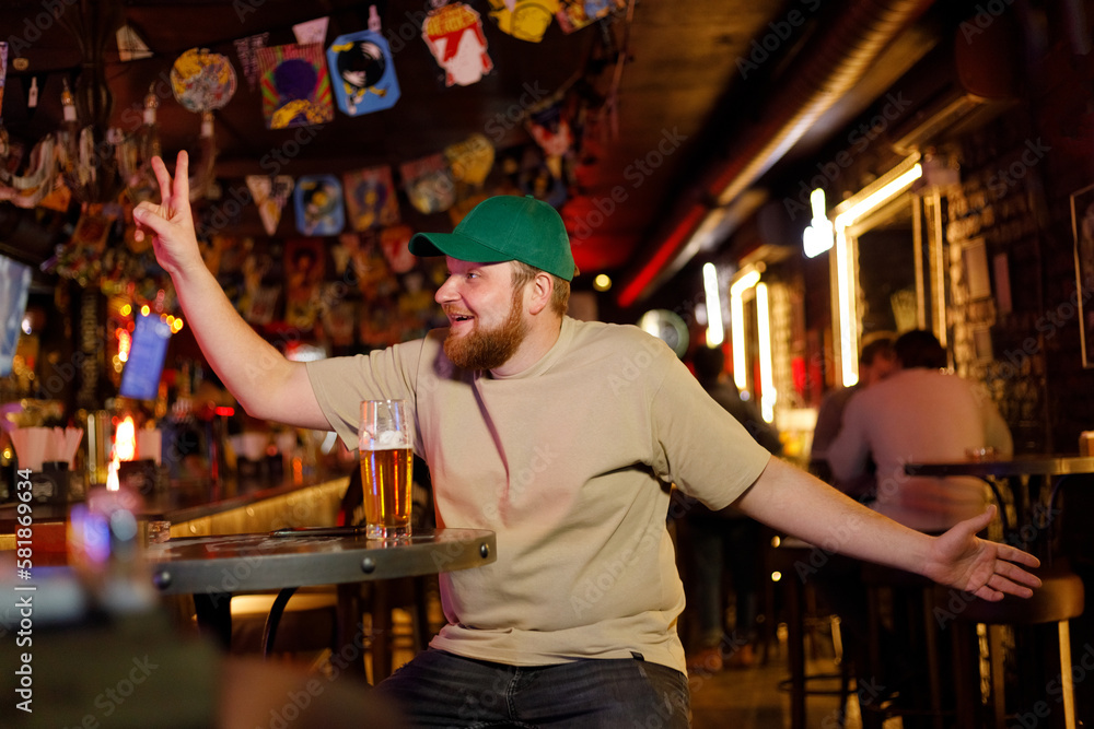 Laughing Man At The Bar Having A good Time Drinking Alcohol
