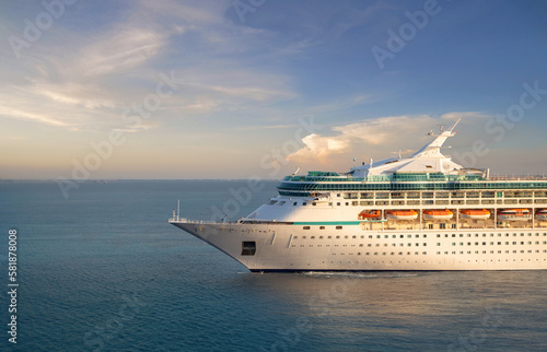 Luxury cruise ship sailing from port on sunrise  © NAN