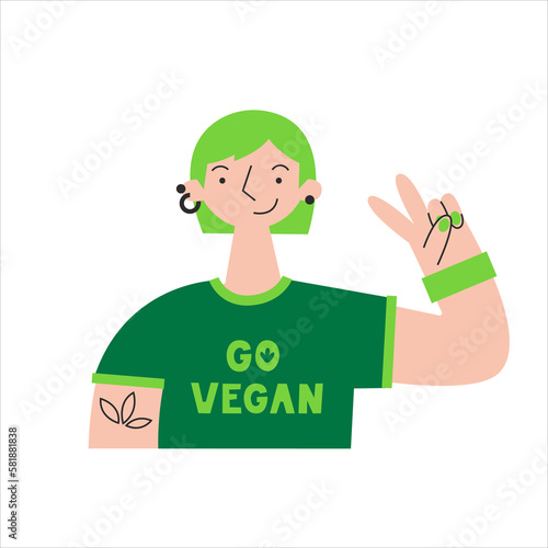 Woman with light skin color in go vegan shirt. Vegetarian plant-based healthy diet. Sustainable, cruelty-free climate-friendly meatless dairy-free food. Meat and animal protein replacement.