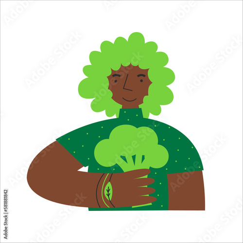 Black woman in green with curly hair holds broccoli. Vegan and plant-based healthy diet concept. Sustainable flexitarian food. Animal protein and dairy replacement. photo