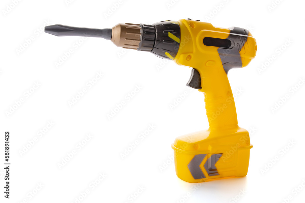 Yellow plastic toy drill screwdriver with bit isolated on white background Yellow plastic toy drill screwdriver with bit isolated on white background