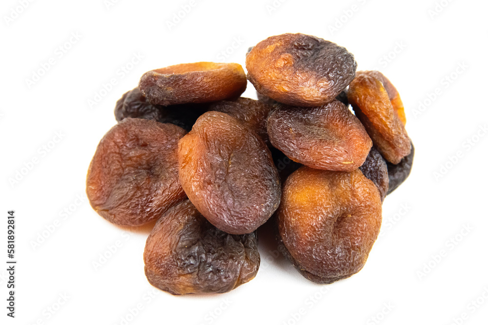 Brown dried apricots isolated on a white background. Brown dried apricots high resolution image. noise effect. Noise and Pollution Effect on photos. Top view. Brown dried apricots isolated on a white background. Brown dried apricots high resolution image. noise effect. Noise and Pollution Effect on photos. Top view.