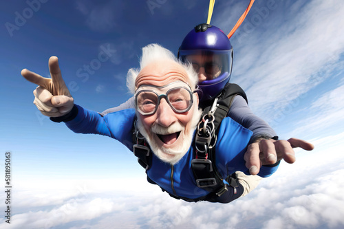 Obraz na plátně Senior man having a blast by skydiving