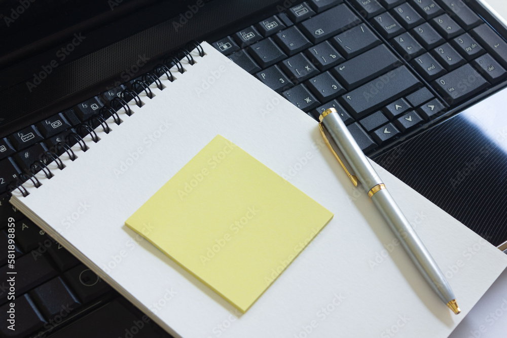 notebook and pen on the table notebook and pen on the table