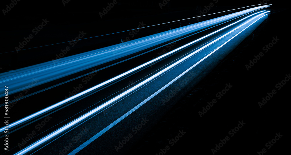 blue car lights at night. long exposure blue car lights at night. long exposure