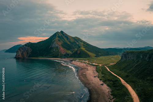 Tihaia Bay in the Sea of ​​Okhotsk Sakhalin! Picturesque hills and bright water, seagulls and clear weather! Summer picturesque landscape!