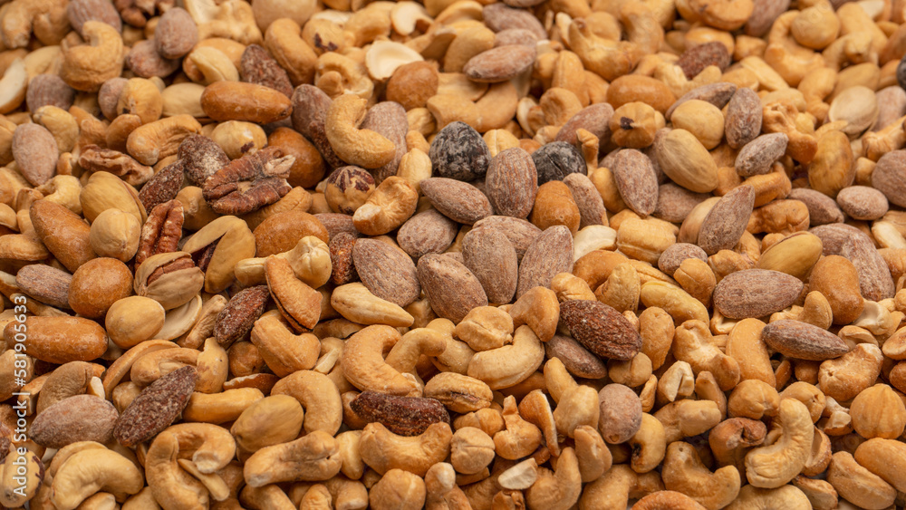 A group of almonds, pistachios, walnuts, macadamia, cashews. A group of almonds, pistachios, walnuts, macadamia, cashews.