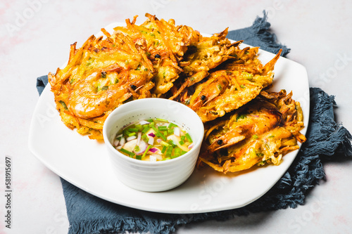Okoy –Filipino-style shrimp and vegetable fritter usually eaten as a simple appetizer or quick snack.