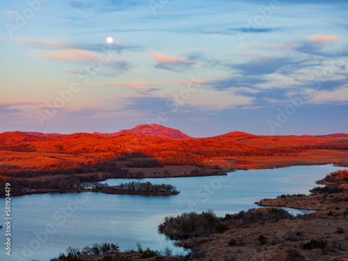 Sunset landscape with a full moon in Wichita Mountains National Wildlife Refuge © Kit Leong