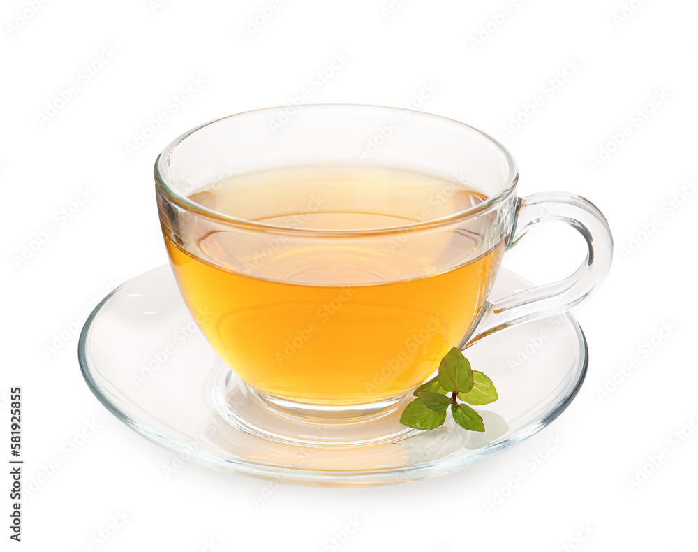 Glass cup of hot green tea on white background